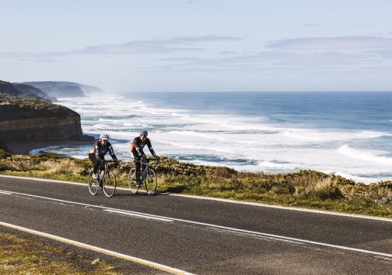 Couple cycling along the Great Ocean Road